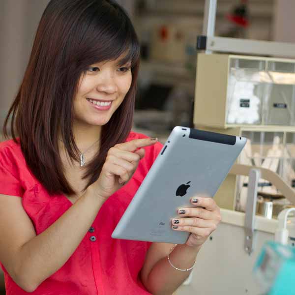woman working on tablet