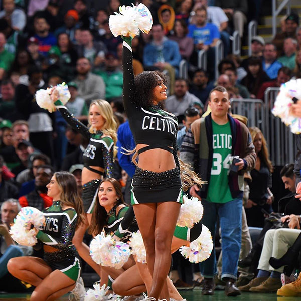 student cheering at Celtics game