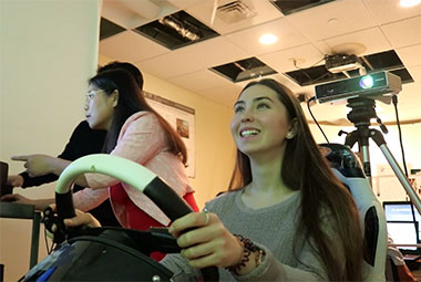 student driving simulated car for ms in human factors