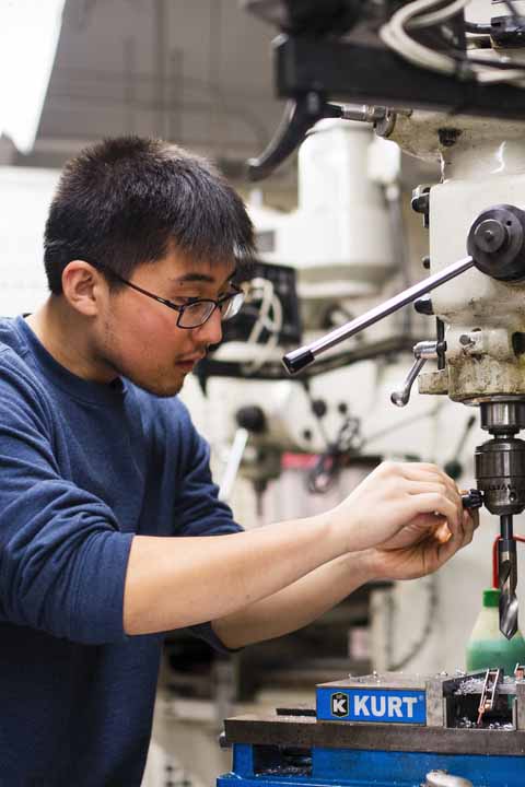 student building with industrial machine